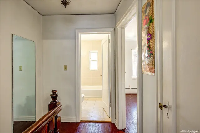 a bathroom with a sink a toilet and a bathtub