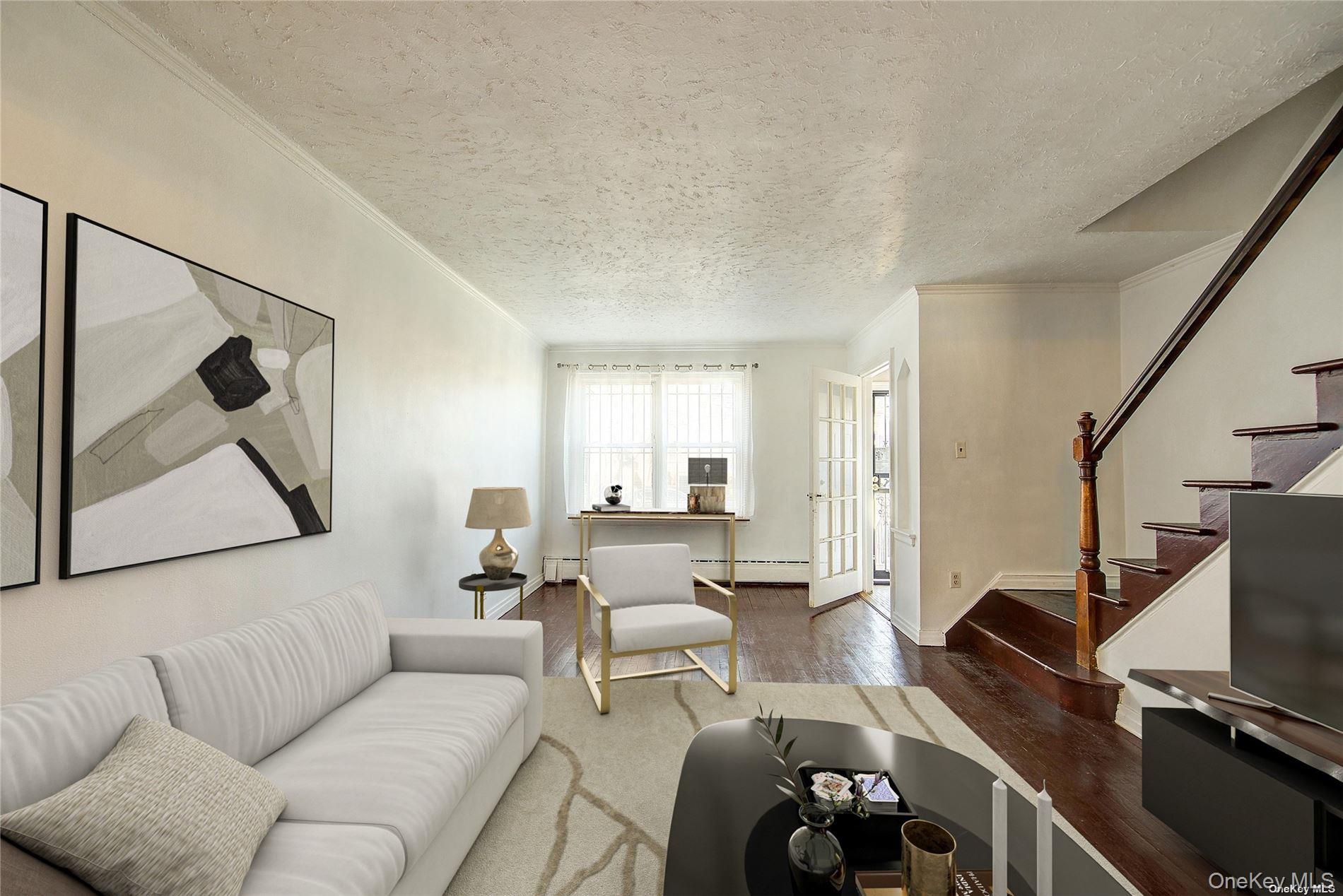 102-20 63rd Road Queens, NY 11375 - Photo 4 of 26 a living room with furniture and a flat screen tv