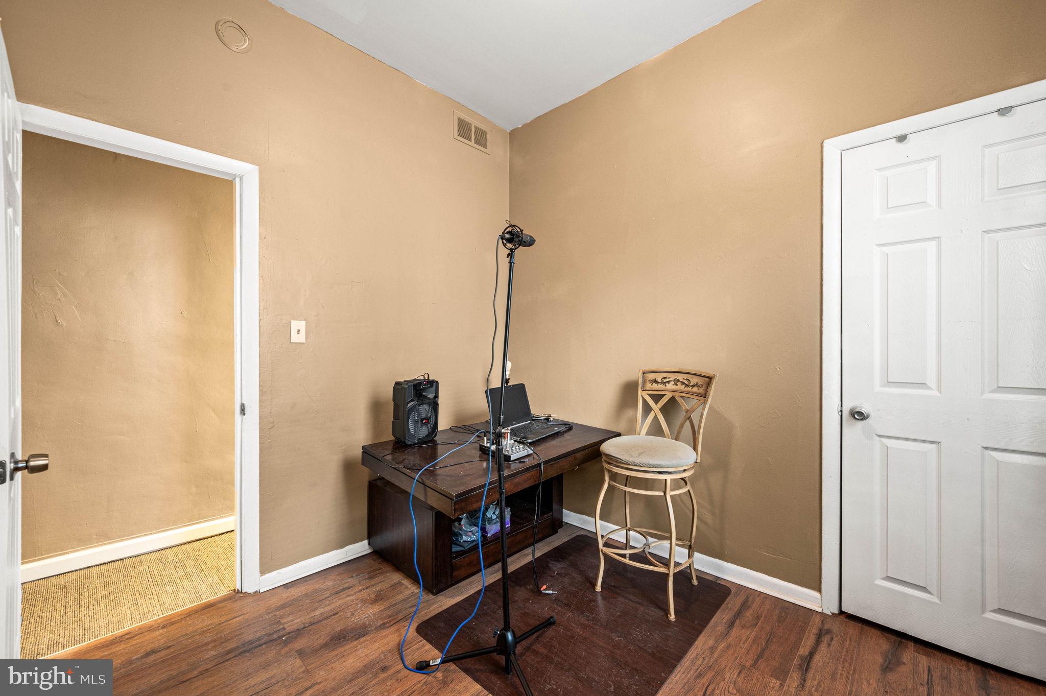 4925 Royal Street Philadelphia, PA 19144 - Photo 14 of 28 a room with furniture and wooden floor