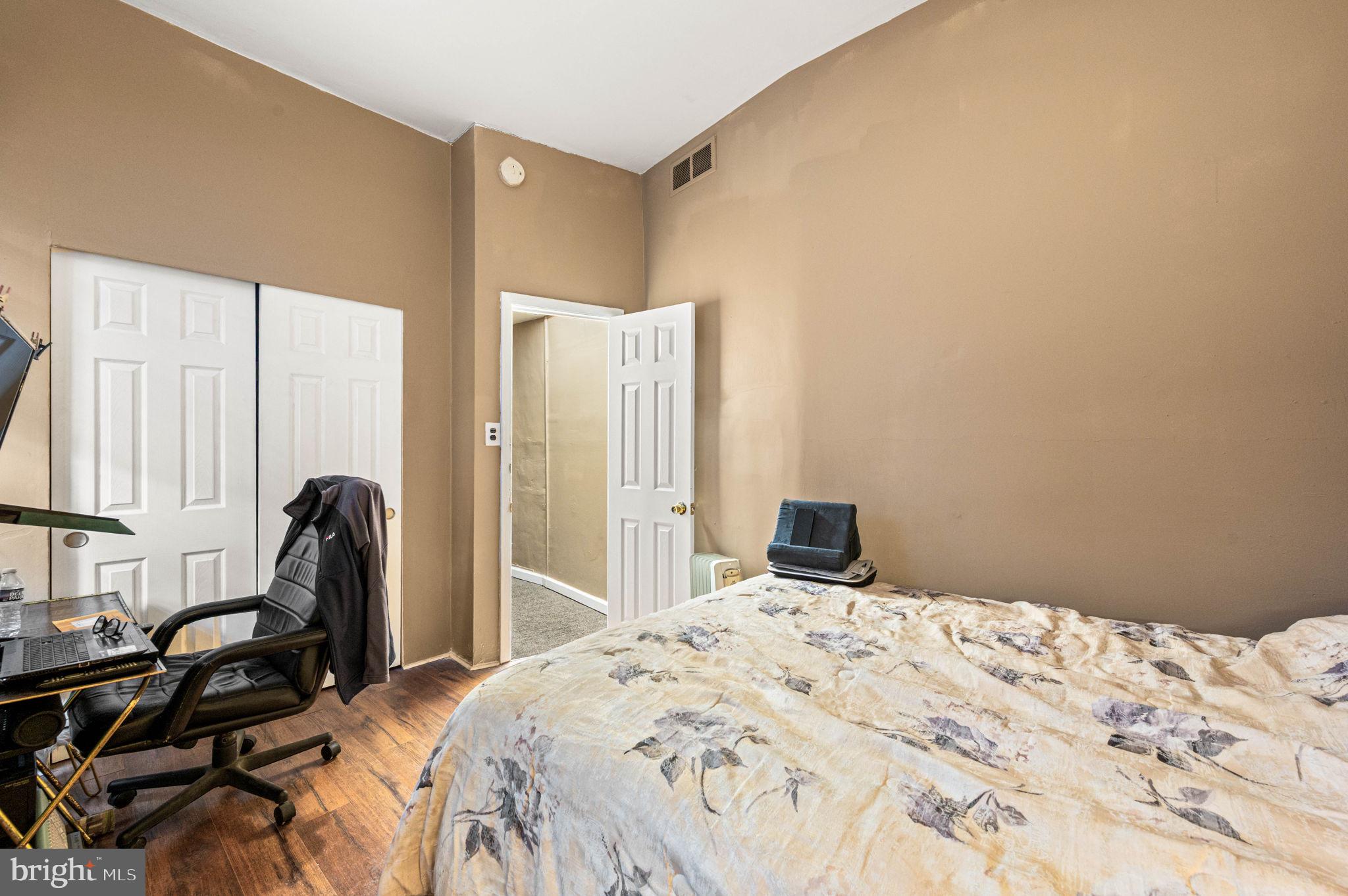 4925 Royal Street Philadelphia, PA 19144 - Photo 16 of 28 a bedroom with a bed and a large window