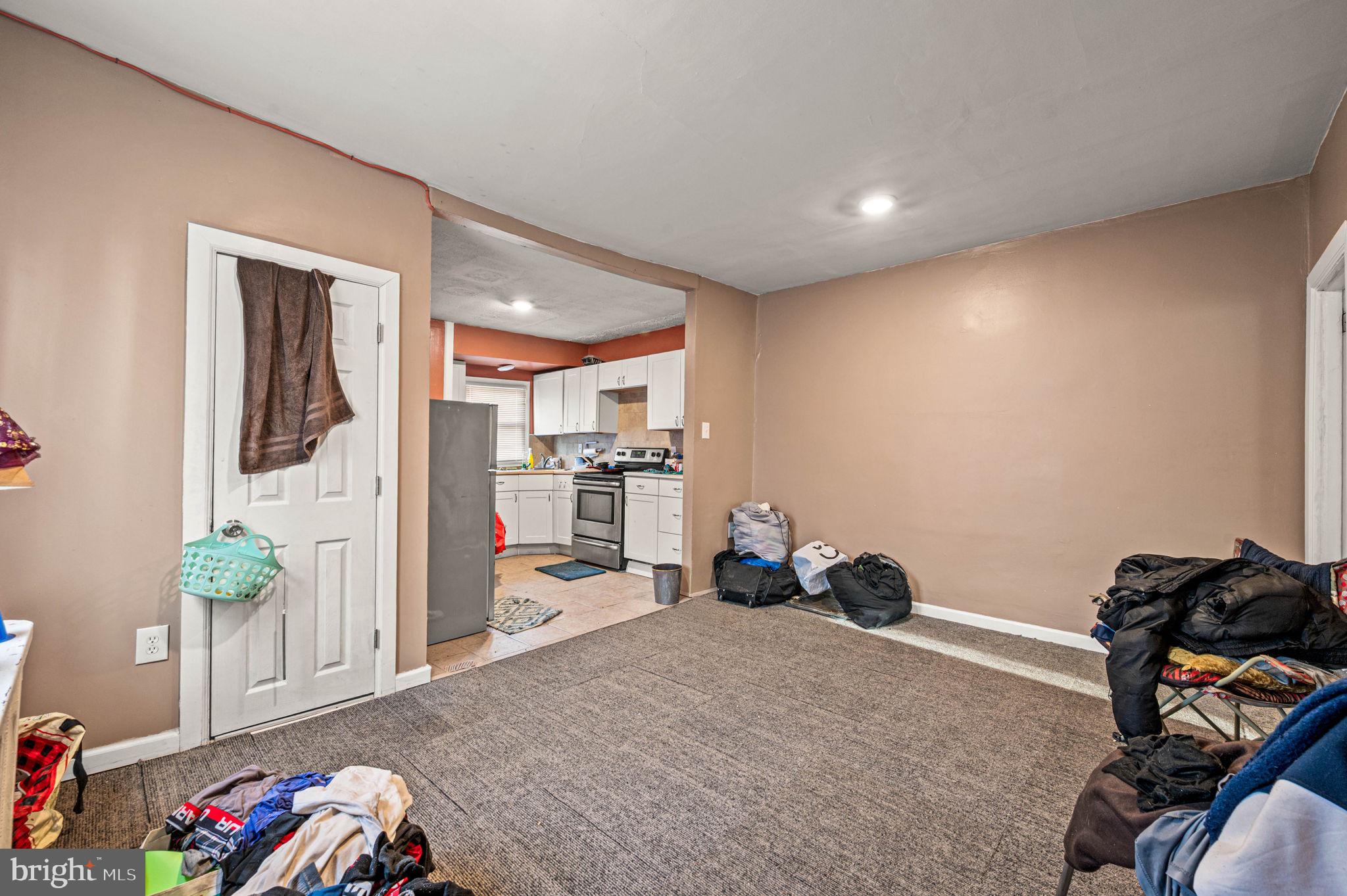 4925 Royal Street Philadelphia, PA 19144 - Photo 26 of 28 a livingroom with furniture and a flat screen tv