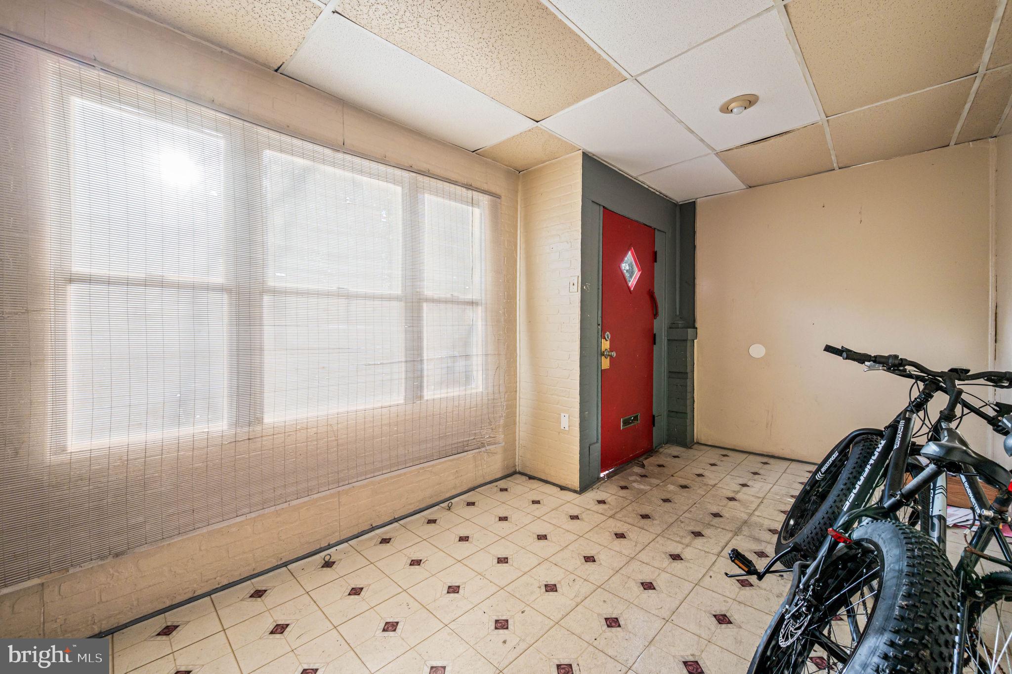 4925 Royal Street Philadelphia, PA 19144 - Photo 3 of 28 a view of a livingroom with wooden floor and windows