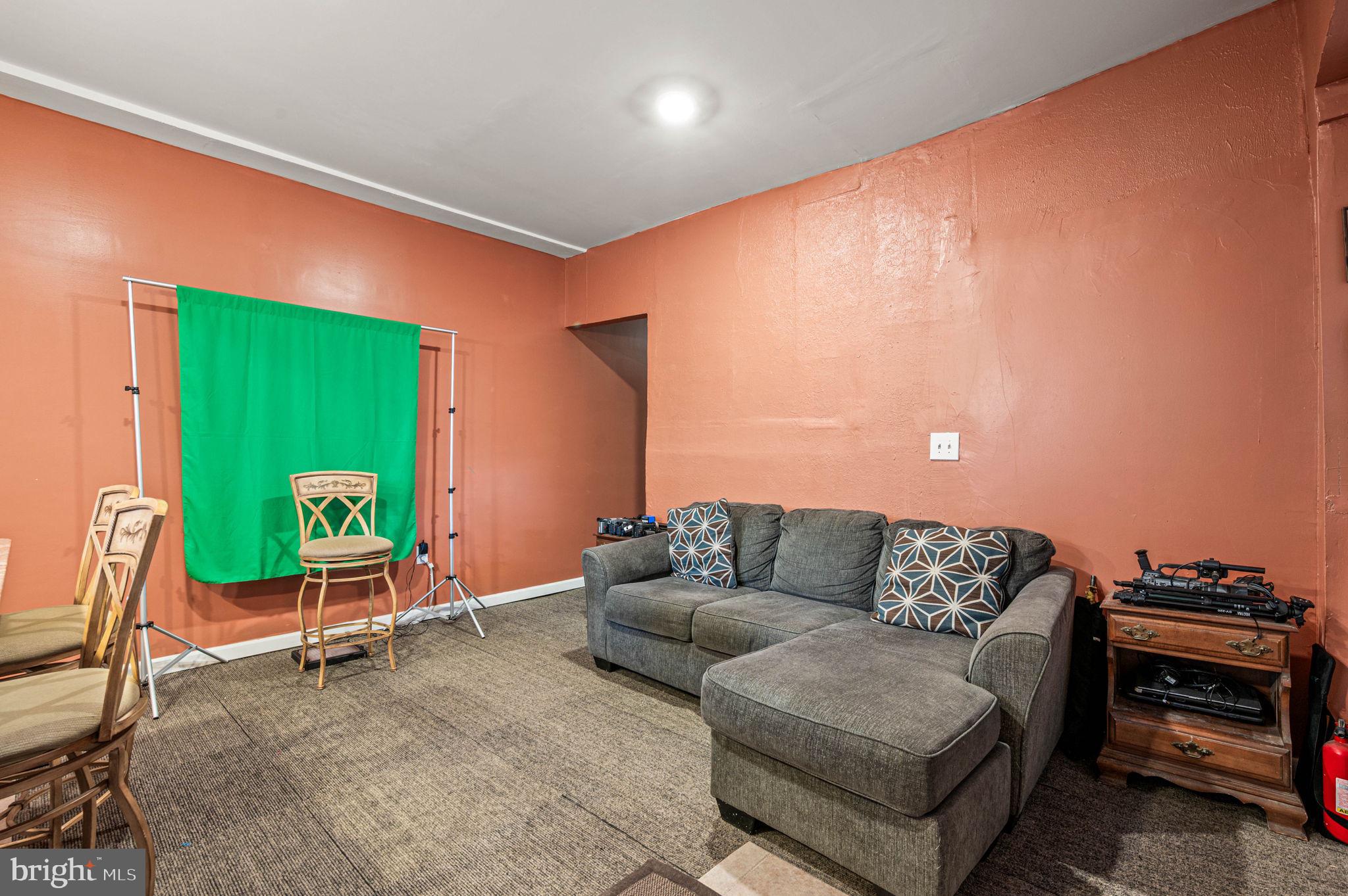 4925 Royal Street Philadelphia, PA 19144 - Photo 5 of 28 a living room with furniture and a wooden floor