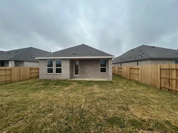 a view of a house with a garden