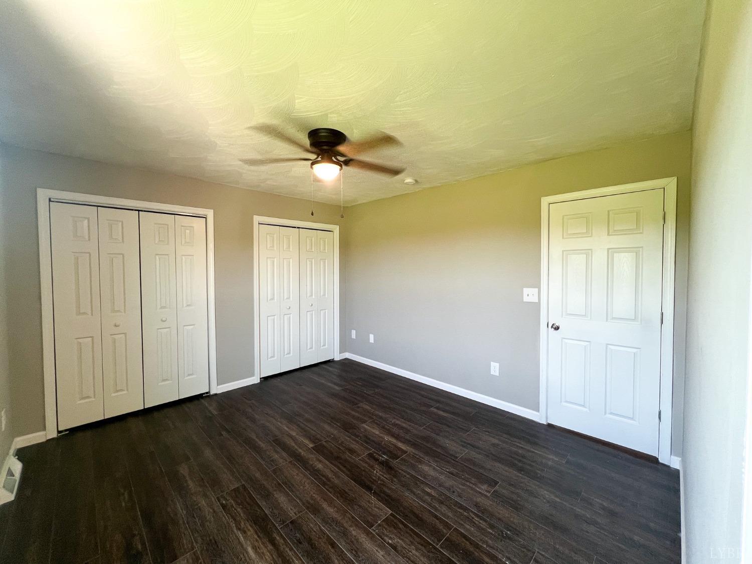 17 Phoebe Pond Road Concord, VA 24538 - Photo 11 of 19 a view of an empty room with wooden floor and a window