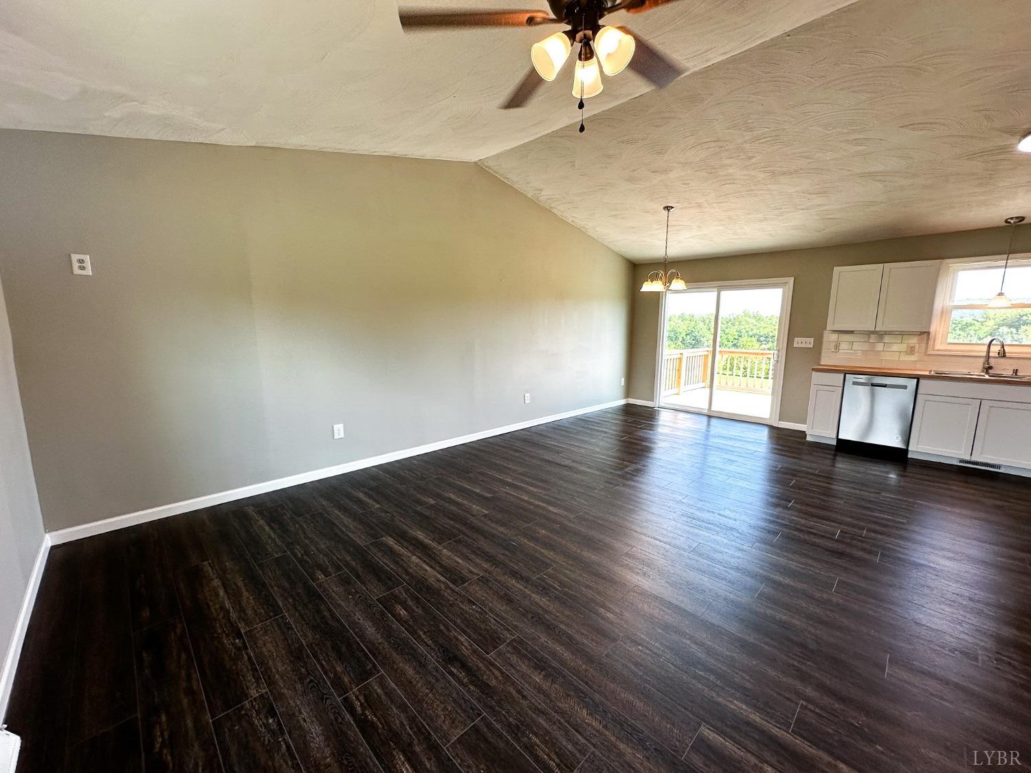 17 Phoebe Pond Road Concord, VA 24538 - Photo 2 of 19 wooden floor in an empty room with a window