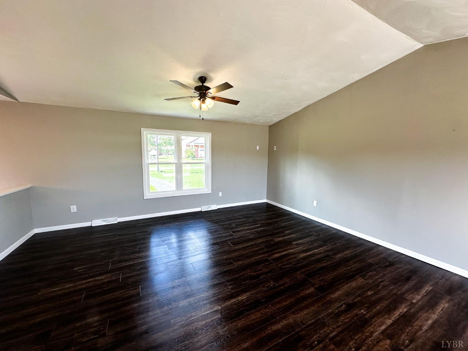 17 Phoebe Pond Road Concord, VA 24538 - Photo 7 of 19 a view of an empty room with wooden floor and a window