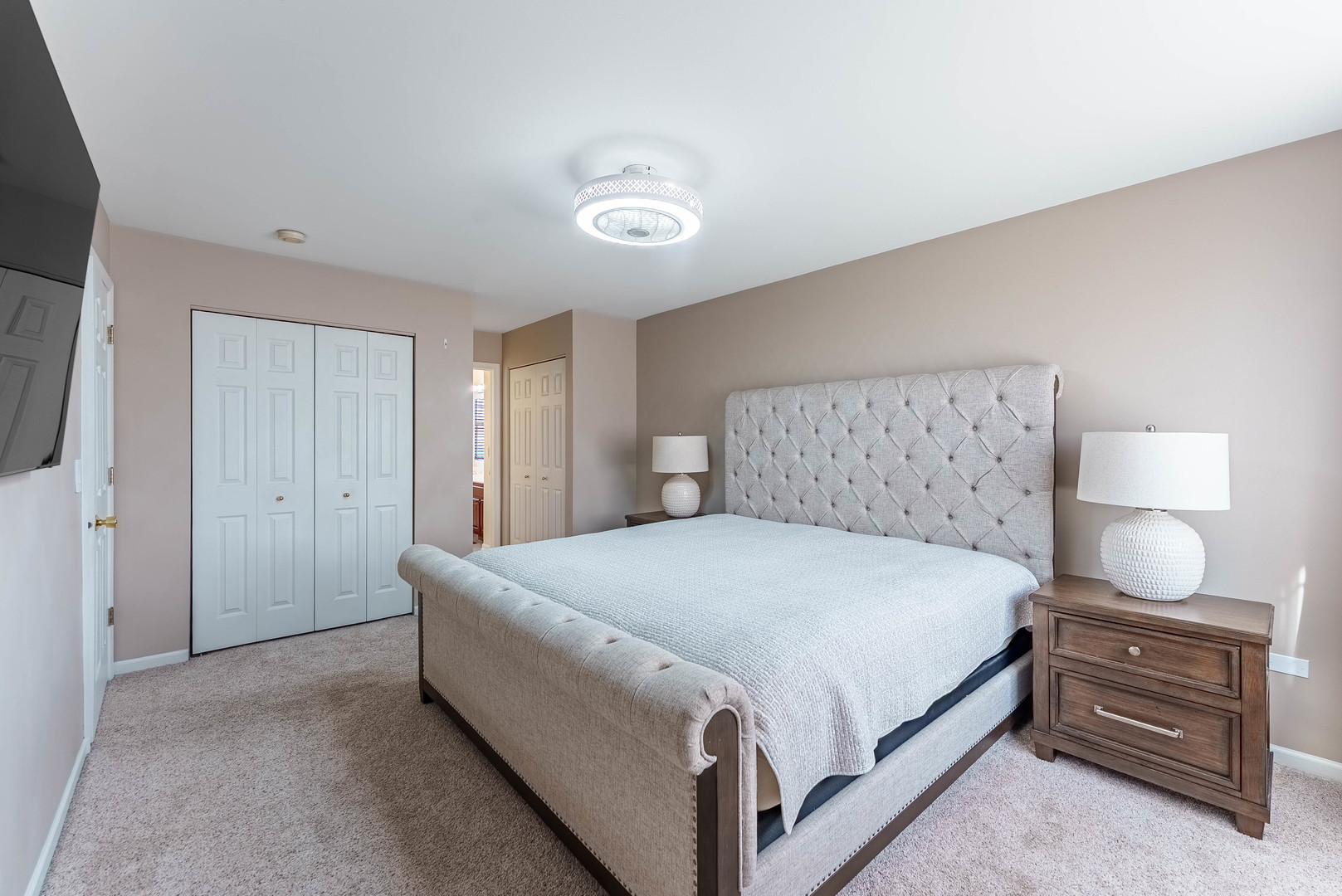1748 Windward Avenue Naperville, IL 60563 - Photo 18 of 23 a spacious bedroom with a bed and window