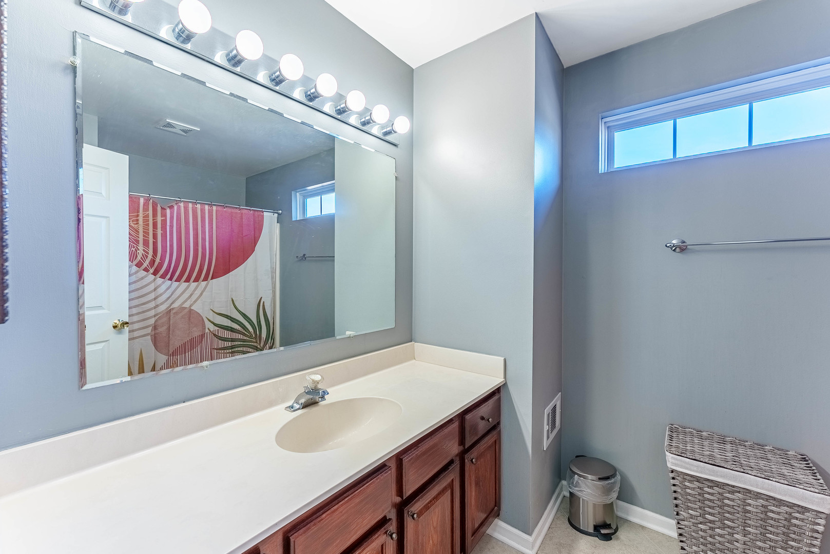 1748 Windward Avenue Naperville, IL 60563 - Photo 6 of 23 a bathroom with a sink and a mirror