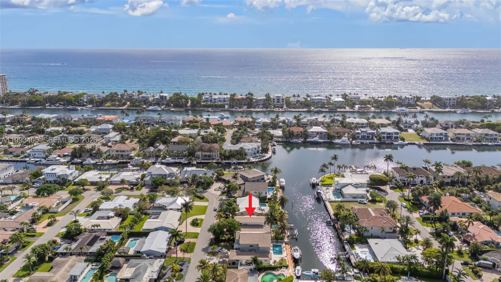 2858 Northeast 33rd Street Lighthouse Point, FL 33064 - Photo 2 of 24 an aerial view of a city with lots of residential buildings