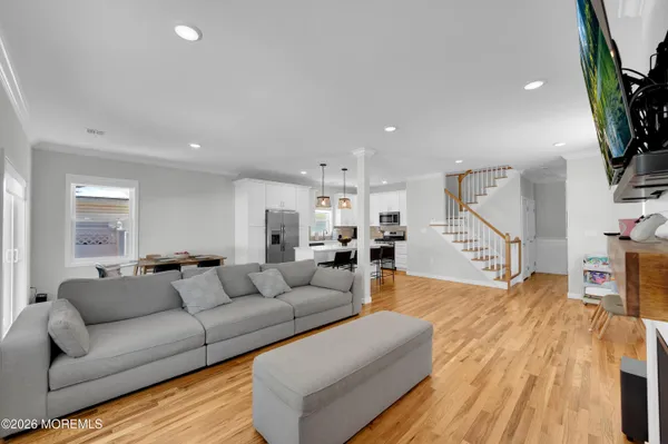 a bedroom with a bed and a chair
