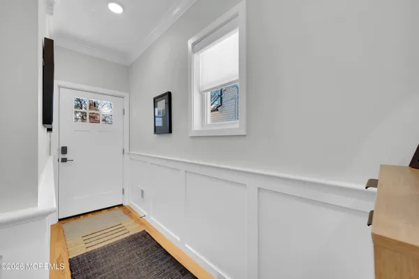 a kitchen with stainless steel appliances granite countertop a sink dishwasher a stove and a refrigerator