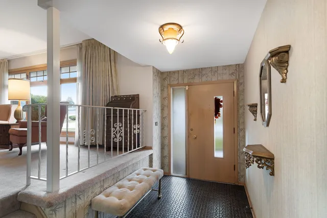 a view of livingroom with furniture and windows