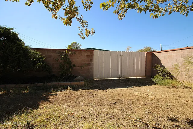 a street view with wooden fence