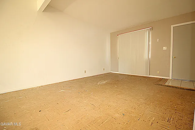 an empty room with natural light