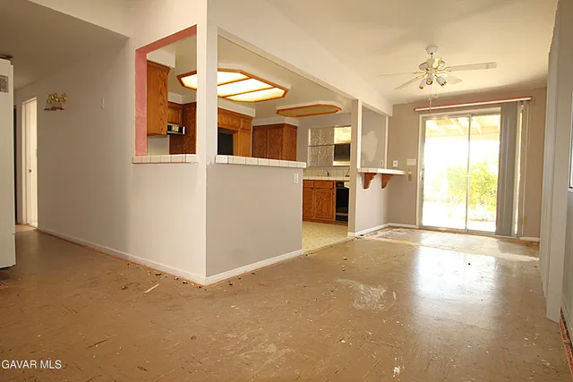 a view of a room with a large window