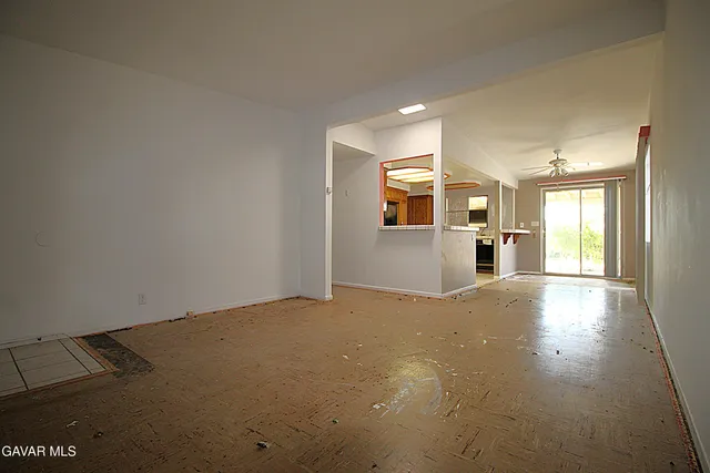 an empty room with windows