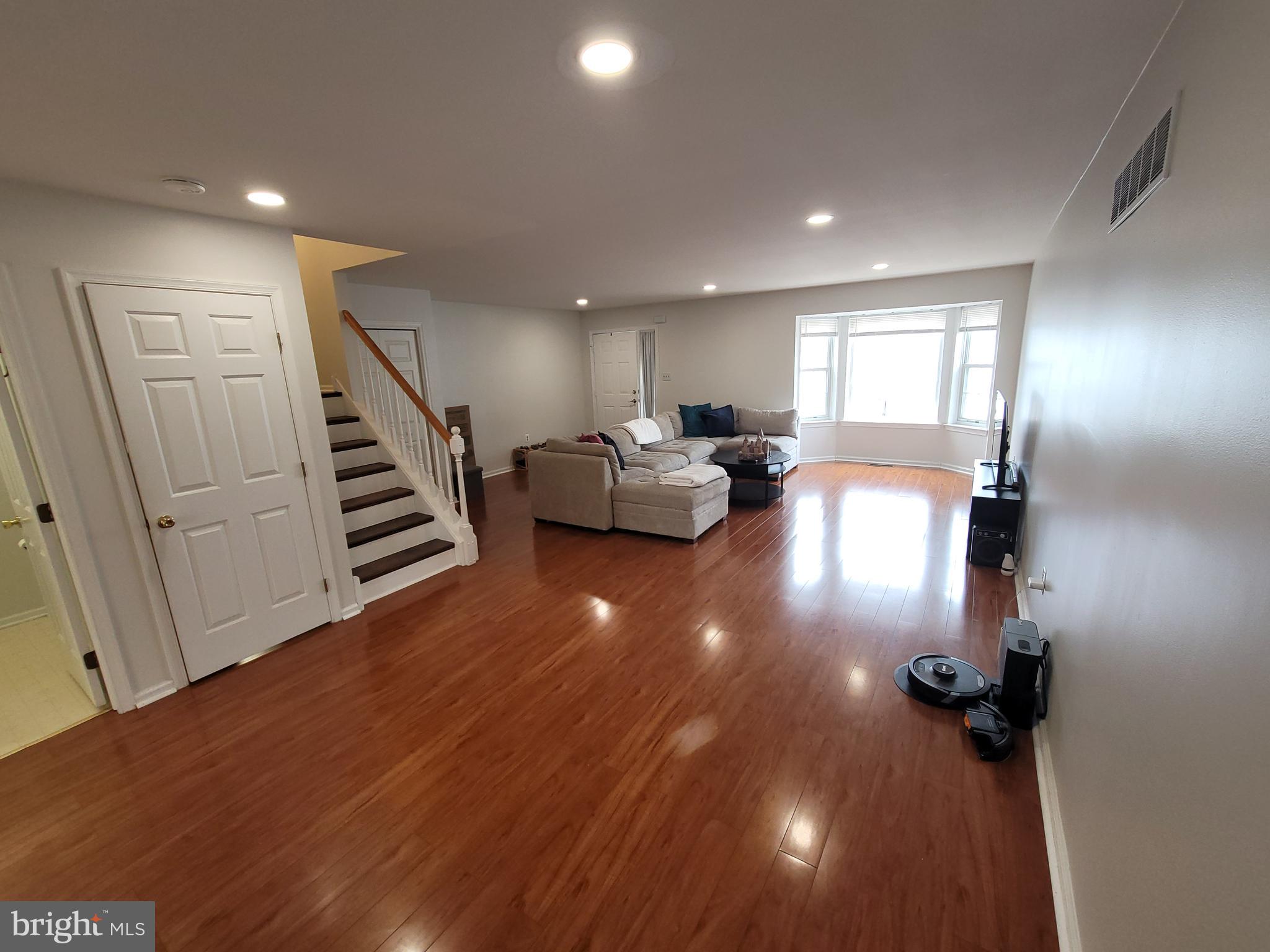 2104 Harrison Court Eagleville, PA 19403 - Photo 5 of 22 a view of entryway and hall with wooden floor