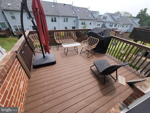 a view of a chairs on wooden deck