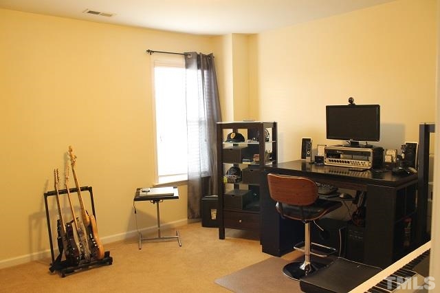 817 Stackhurst Way Wake Forest, NC 27587 - Photo 11 of 23 One of 4 full bedrooms. Currently used as a music room. With such spacious dimensions, these rooms can be used any way you like!