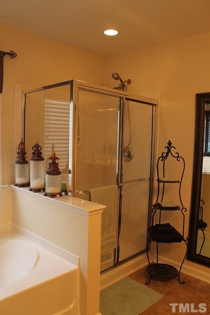 817 Stackhurst Way Wake Forest, NC 27587 - Photo 16 of 23 Upgraded to oversized walk-in shower. This home is LOADED with tremendous upgrades.