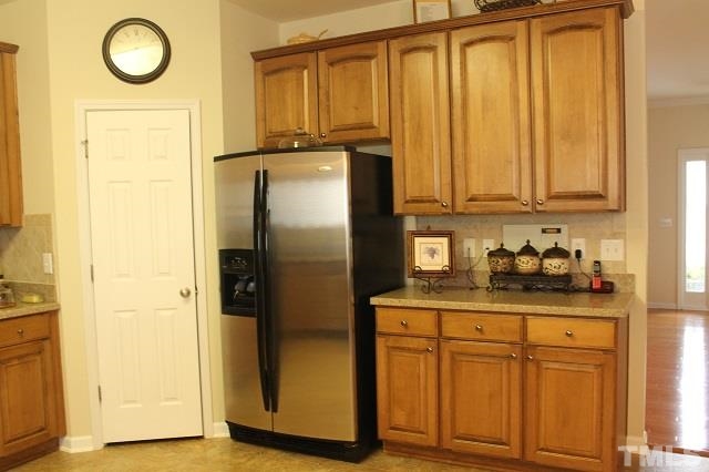817 Stackhurst Way Wake Forest, NC 27587 - Photo 18 of 23 TONS of countertop and cabinets! Upgraded Stainless Steel appliances convey with home!