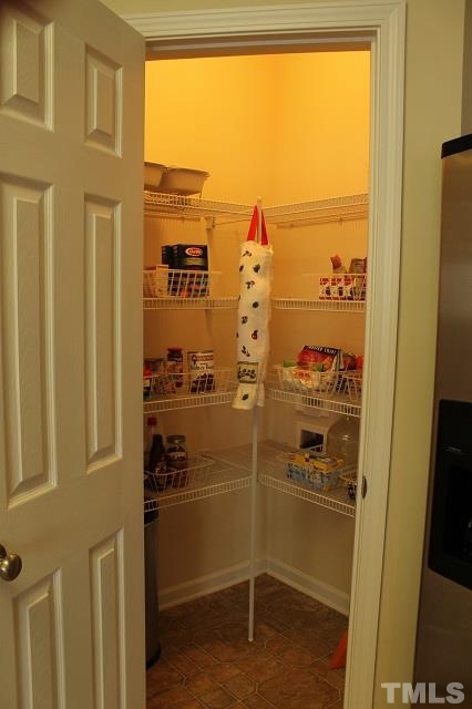 817 Stackhurst Way Wake Forest, NC 27587 - Photo 20 of 23 Spacious walk-in pantry.