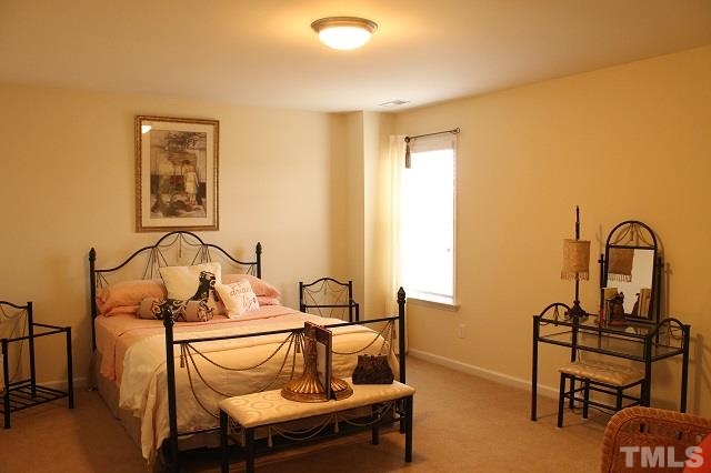817 Stackhurst Way Wake Forest, NC 27587 - Photo 9 of 23 4 Full Bedrooms. All feature upgraded carpet and pad.