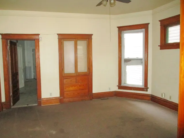 an empty room that has a window