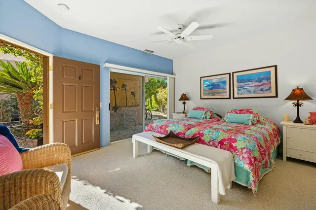 a bathroom with a bathtub shower sink vanity and toilet