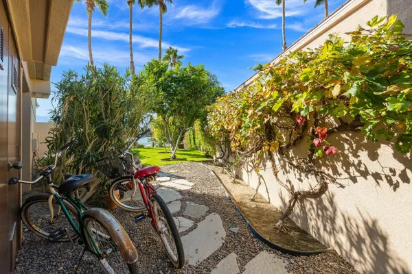 a utility room with cabinets washer and dryer