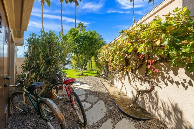 a utility room with cabinets washer and dryer