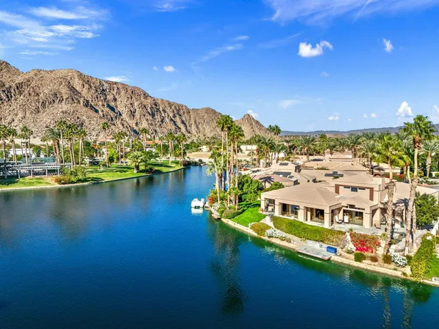an aerial view of a house with a garden