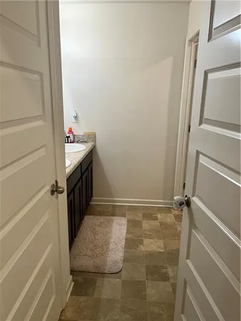 a bathroom with a toilet a sink and a bathtub