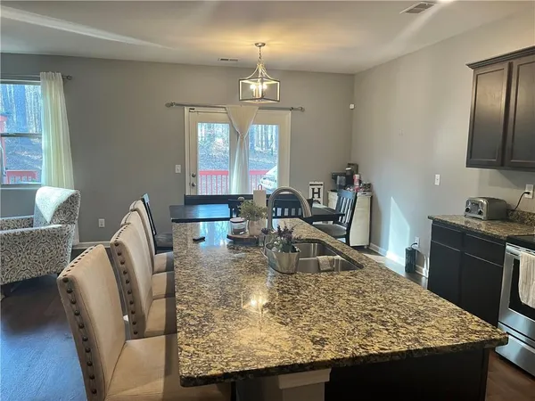 a view of a dining room with furniture