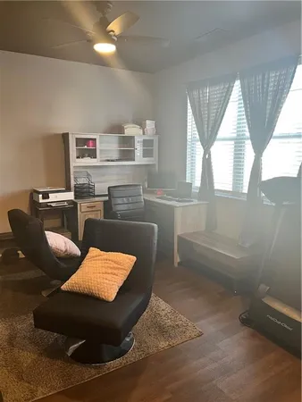 a kitchen with stainless steel appliances granite countertop a sink and a refrigerator