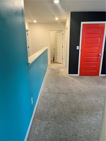 a view of hallway with stairs