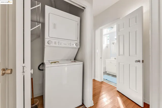 a view of bathroom with washer and dryer