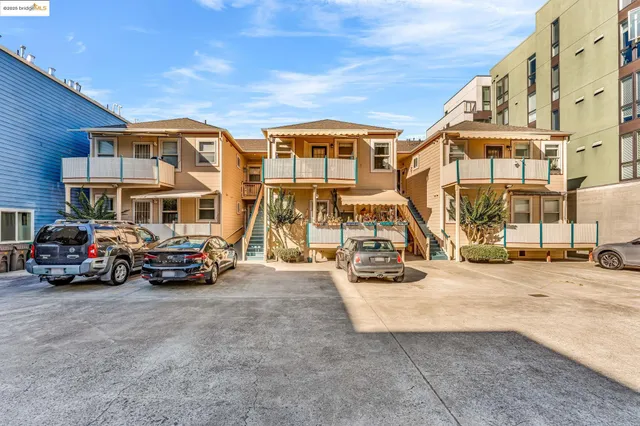 a view of a car in front of a building