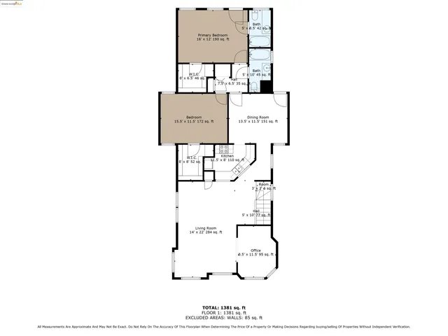 a picture of a bench in front of a wall