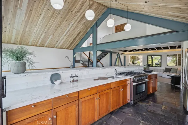 a view of a patio with a table and chairs