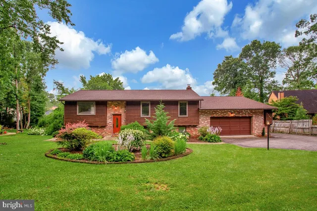 a view of a house with a garden