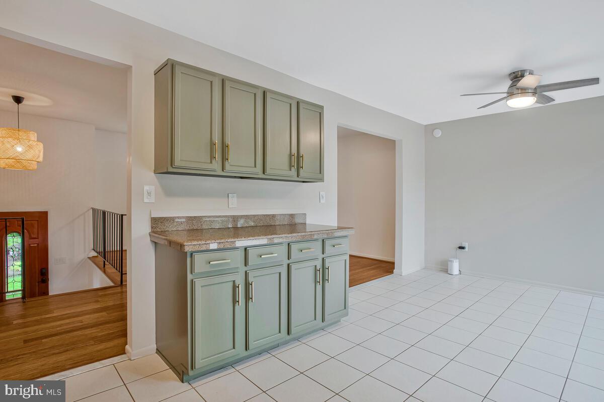 1428 Oak Bluff Road Edgewater, MD 21037 - Photo 14 of 43 a spacious bathroom with a sink and a mirror