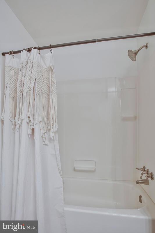 1428 Oak Bluff Road Edgewater, MD 21037 - Photo 17 of 43 a bathroom with a shower and a tub