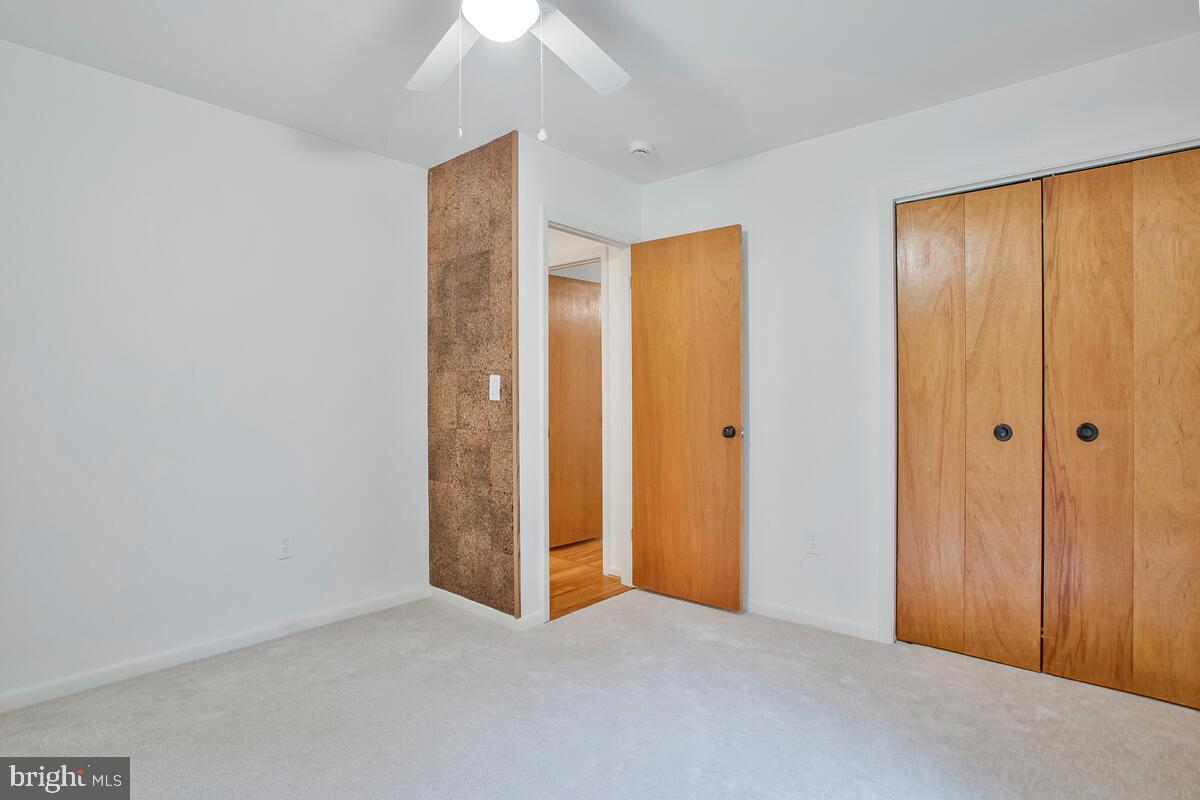 1428 Oak Bluff Road Edgewater, MD 21037 - Photo 24 of 43 an empty room with closet area