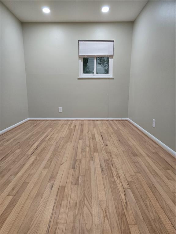 3817 Captain Drive Atlanta, GA 30341 - Photo 12 of 18 a view of an empty room with wooden floor and a window