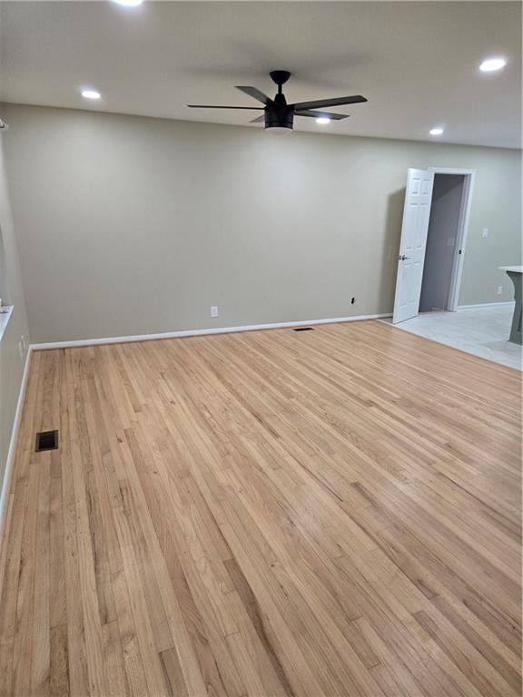 3817 Captain Drive Atlanta, GA 30341 - Photo 6 of 18 a view of an empty room with wooden floor