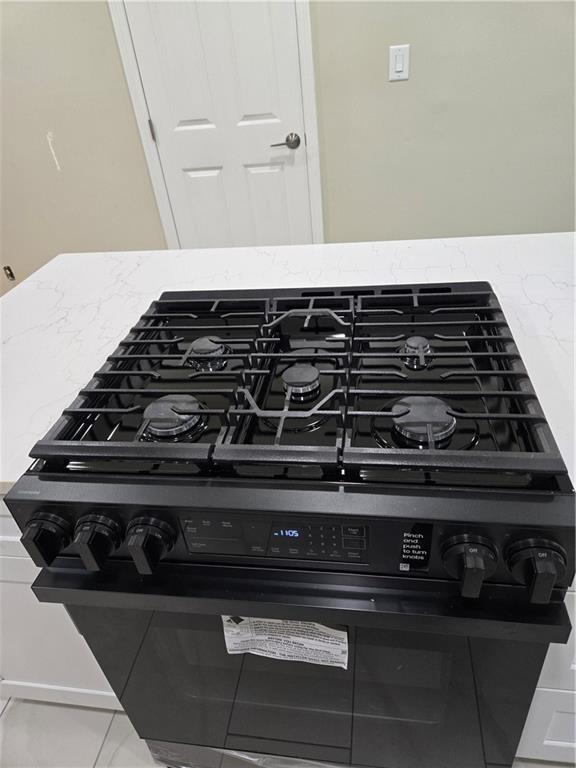 3817 Captain Drive Atlanta, GA 30341 - Photo 9 of 18 a close up of a stove