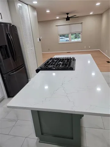 a view of a refrigerator in the kitchen