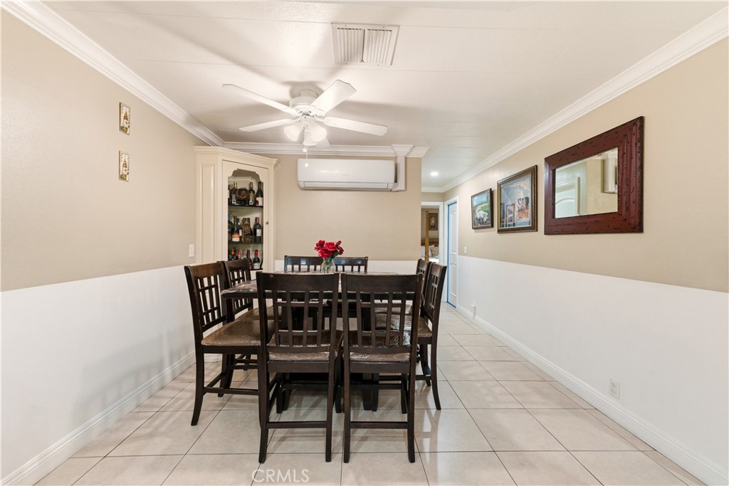 133 Colombo Lane Tustin, CA 92780 - Photo 11 of 26 a view of a dining room with furniture